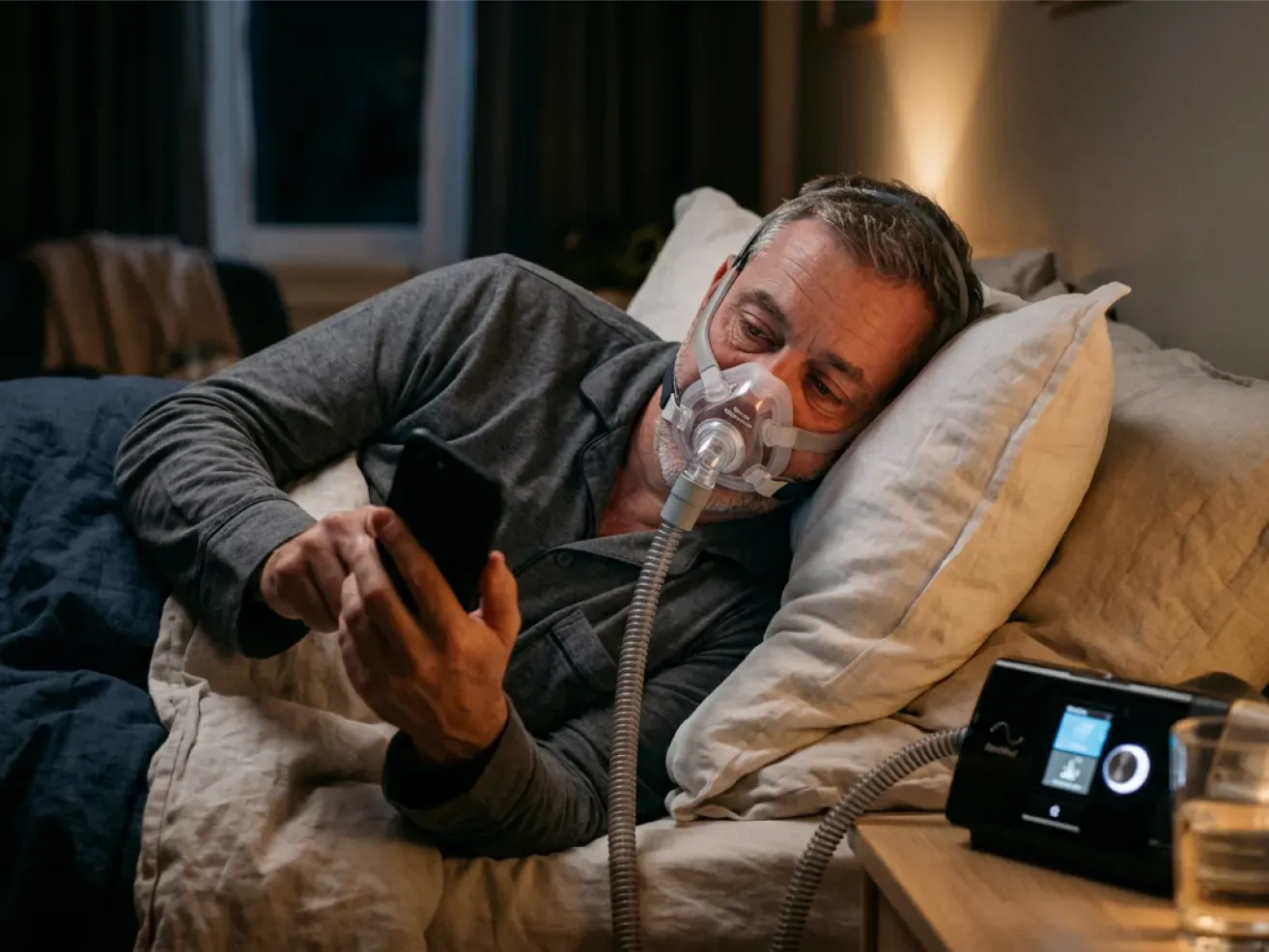 Patient using CPAP therapy comfortably at home